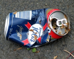 An empty crushed beer can