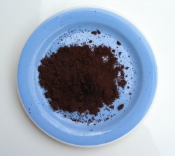 How can I reuse or recycle spent coffee grounds?