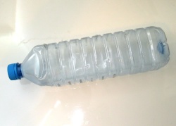 How can I reuse or recycle plastic water bottles?