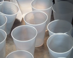 How can I reuse or recycle plastic cups?