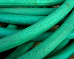 How can I reuse or recycle … old garden hose?