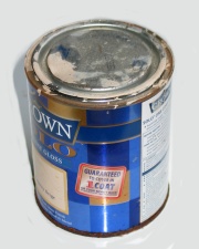 How can I reuse or recycle empty paint tins?