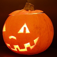 A jack-o-lantern carved out of a pumpkin