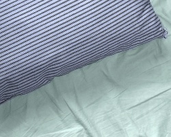 Pillow on a sheet