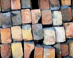 How can I reuse or recycle broken bricks?