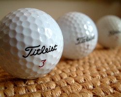 How can I reuse or recycle old golf balls?