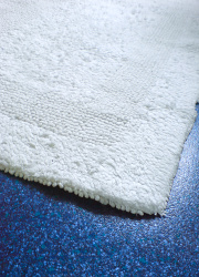 How can I reuse or recycle an old bath mat?