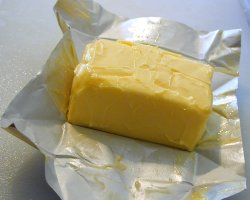 How can I reuse or recycle butter wrappers?