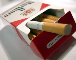 How can I reuse or recycle cigarette packets?
