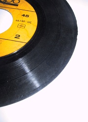 How can I reuse or recycle old vinyl 45s?