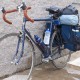 What can I reuse or recycle to repair the mesh on bicycle panniers?